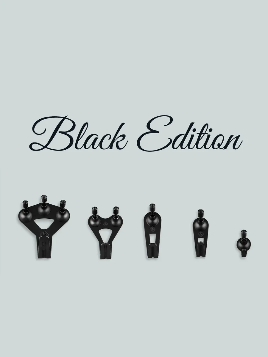 Black Edition: fünf schwarze FLOREAT-Haken in Größen von groß bis klein auf Hellgrau