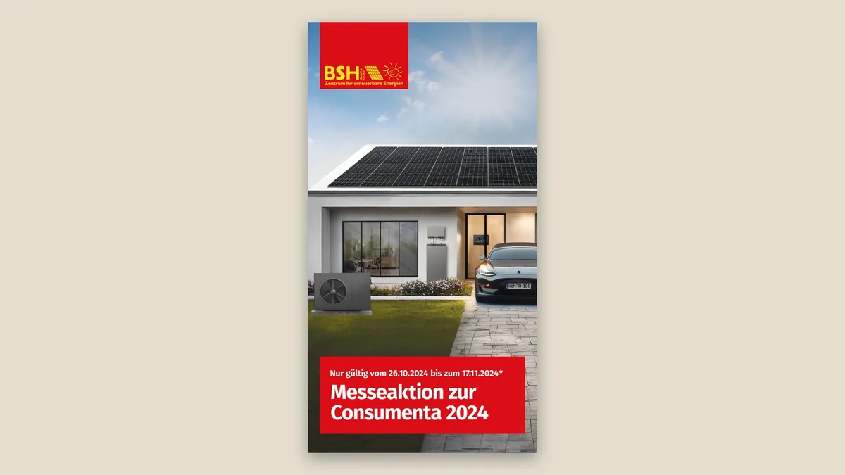 Gedruckte Vorderseite des Consumenta-Flyers mit Einfamilienhaus und Solardach